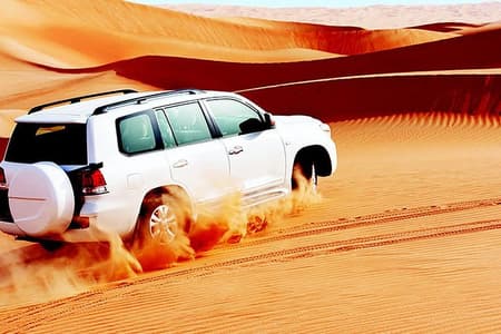 Red Dunes Safari with Sandboarding & Camel Ride from Ras Al Khayma