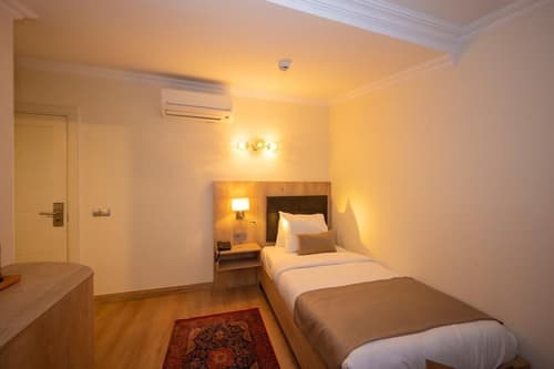 Porta Romanos Hotel, Room